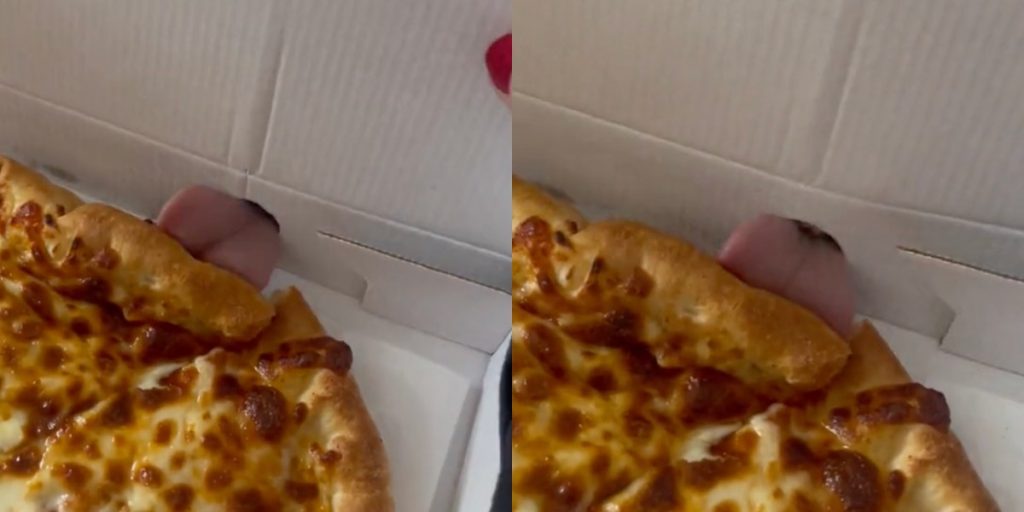 Par åbner pizzaæske og finder noget lyserødt, der bevæger sig indeni