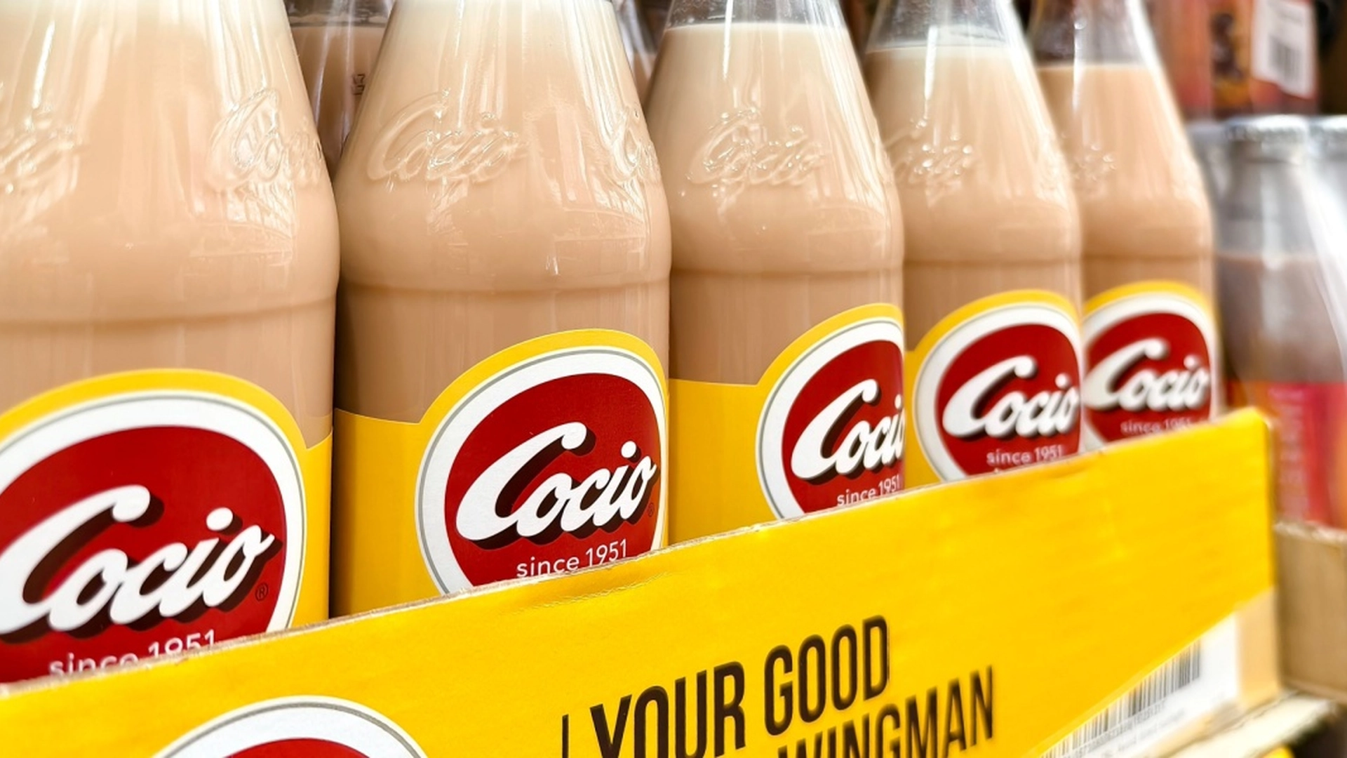 Cocio får bøde og sur smiley: Dryppede ned i åbne flasker