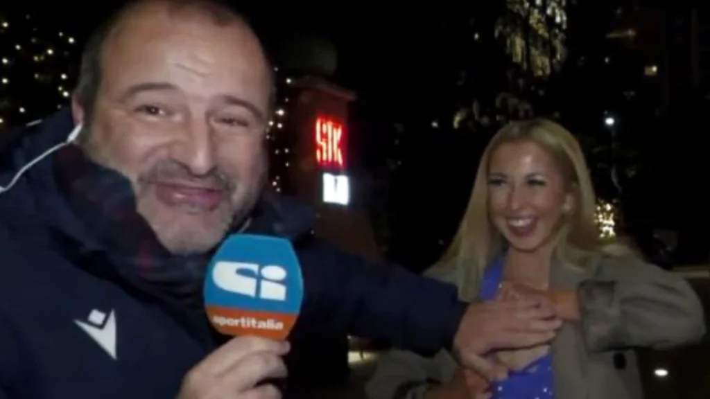 Kvindelig fan stjæler rampelyset på live-tv: Pludselig trækker hun ned i kjolen